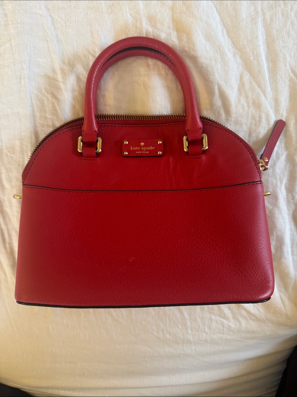 kate spade red dome-shaped satchel with gold hardware